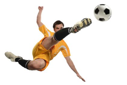 Soccer,Player,Kicking,Ball,While,Jumping,Isolated,Over,White,Background